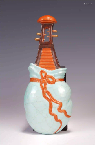 A CHINESE FAMILLE ROSE BOTTLE