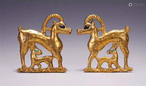 A PAIR OF CHINESE GILT BRONZE AUSPICIOUS BEAST