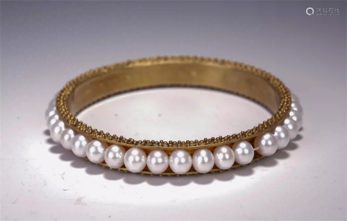 A CHINESE GILT SILVER INLADE DONGZHU BRACELET