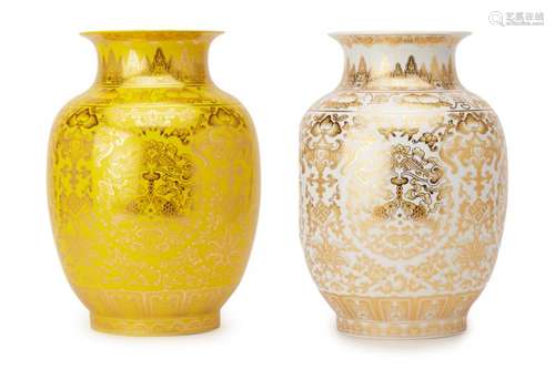 TWO SIMILAR GILT DECORATED PORCELAIN VASES