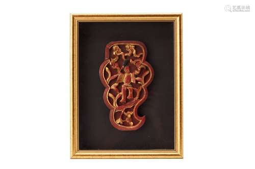 A FRAMED ANTIQUE CHINESE CARVING