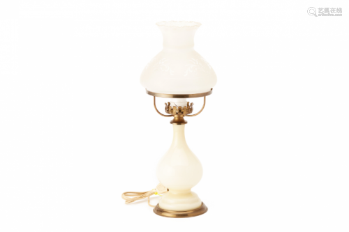 AN OIL LAMP STYLE TABLE LAMP