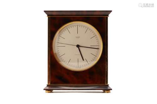 AN HERMES LACQUERED AND GILT TABLE CLOCK