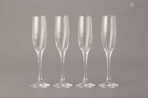 A SET OF FOUR FABERGE CHAMPAGNE FLUTES