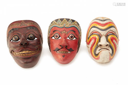 THREE VINTAGE WOODEN JAVANESE THEATRE MASKS