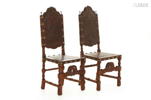 A PAIR OF RENAISSANCE REVIVAL TOOLED LEATHER SIDE CHAIRS