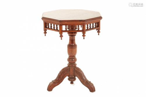 AN OCTAGONAL TEAK TRIPOD TABLE