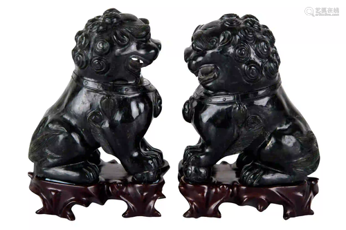 PAIR OF CHINESE CARVED HARDSTONE FOO LIONS