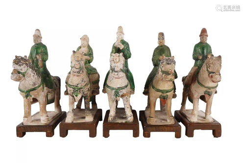 FIVE CHINESE POTTERY EQUESTRIAN FIGURES