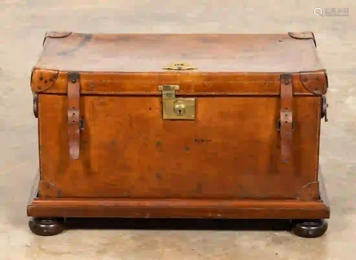 ENGLISH BARONET'S LEATHER TRUNK ON STAND, C. 1910