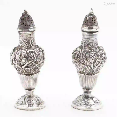 PAIR CONTINENTAL .800 SILVER REPOUSSE CASTORS