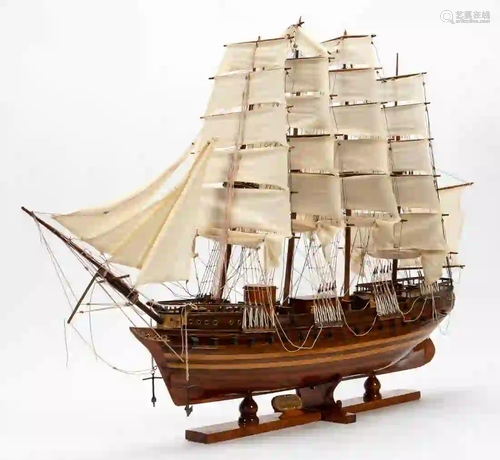 WOODEN MODEL OF A SHIP ON STAND, 