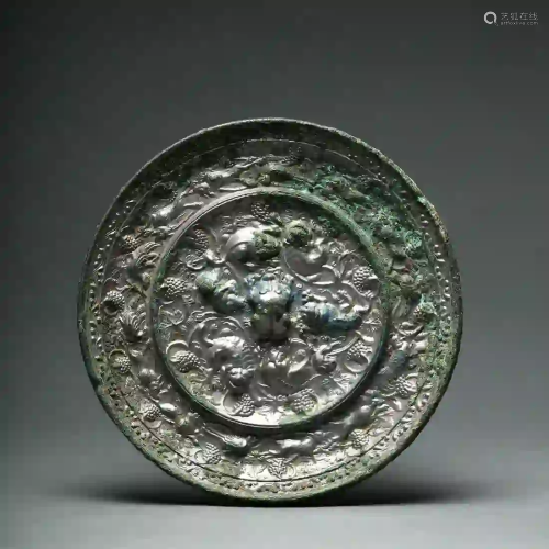 A Tang Dynasty Sea Beasts with Grapes Bronze Mirror
