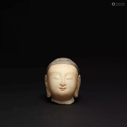 A 17th Century Carved Marble Buddha Head