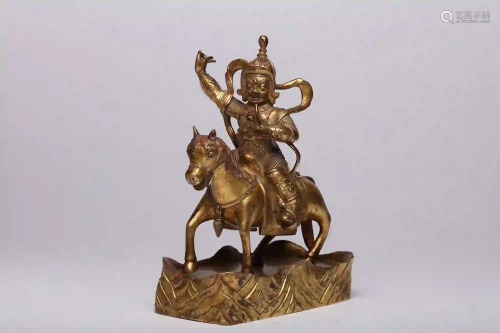 An 18th Century Gilt Bronze God of Wealth Figure