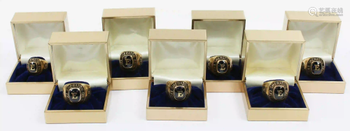 A Group of 7 Sheraton Hotel 10k Rings
