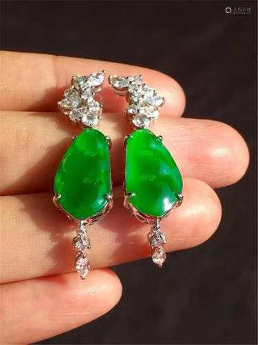 A Pair of Chinese Carved Jadeite Earrings