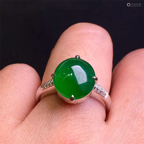 A Chinese Carved Jadeite Ring