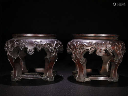 A Pair of Chinese Carved Hardwood Bases