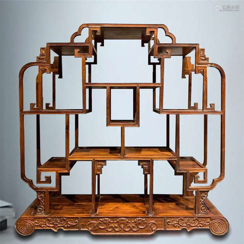 A Chinese Carved Hardwood Cabinet