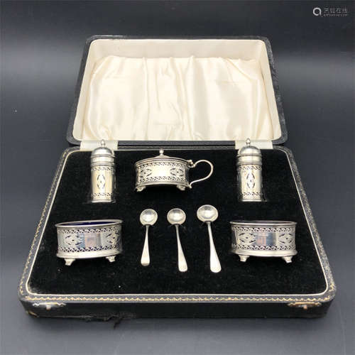 A Set of British Silver Containers