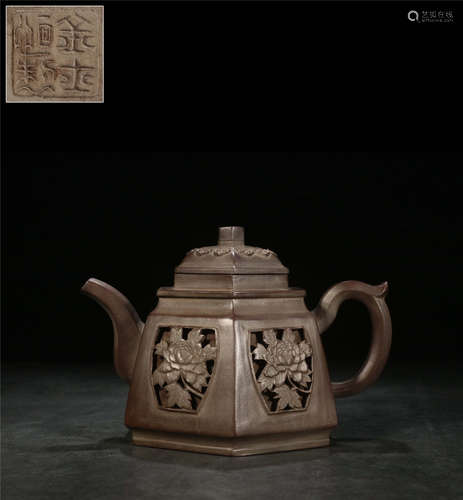 A Chinese Carved Yixing Clay Teapot