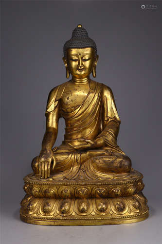 A Chinese Gilt Bronze Figure of Buddha