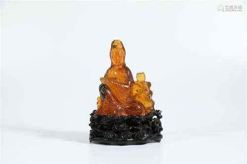 A Chinese Amber Stone Figure of Buddha