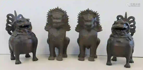 An Antique Pair Of Bronze Foo Lions Together With