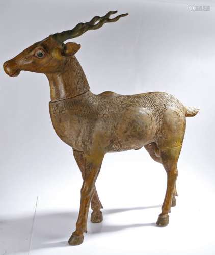 Persian antelope, of large proportions, with a sand yellow body and curled horns, 93cm high