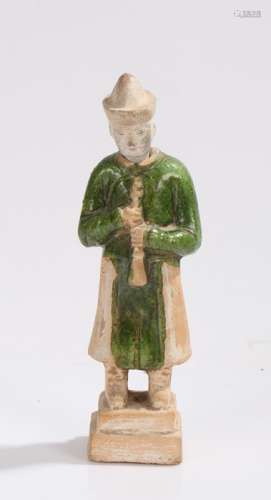 Chinese tomb warrior, modelled holding a musical instrument, 25.5cm high