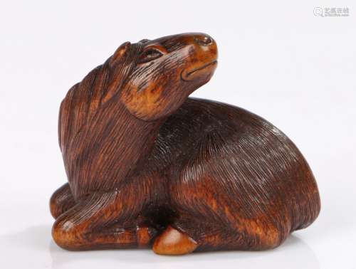 Fine Japanese carved wood netsuke, signed Sari, of a horse arching the neck, signed to the base, 4.