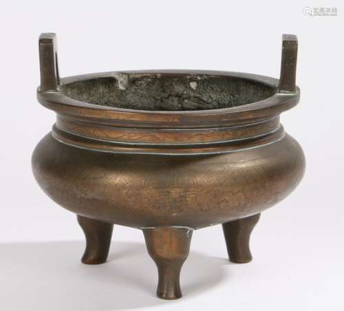 Chinese Qing Dynasty bronze censer, the censer surmounted by a pair of rectangular angled loops