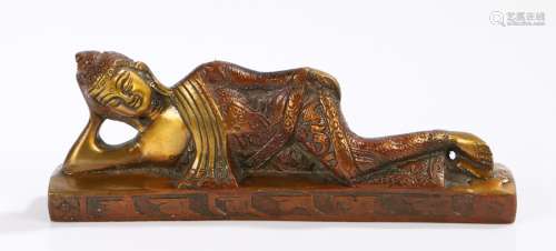 Cast gilt metal reclining Buddha, 21cm wide