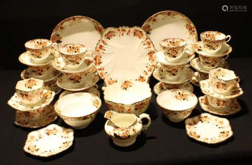 A Staffordshire Radfordian Imari palette tea set for twelve, comprising twelve teacups, saucers