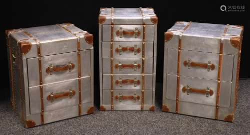 A pair of contemporary bedside cabinets, overlaid with foil, rectangular top above two short