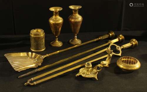 A Regency style brass companion set; a pair of Persian style inverted baluster brass vases; etc