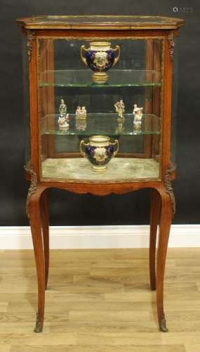 A 19th century Louis XV Revival gilt metal mounted rosewood serpentine room centre bijouterie
