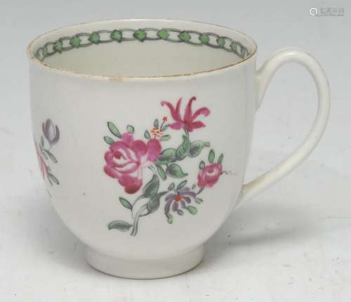 A Pennington Liverpool coffee cup, decorated in polychrome with scattered flowers, loop handle, c.