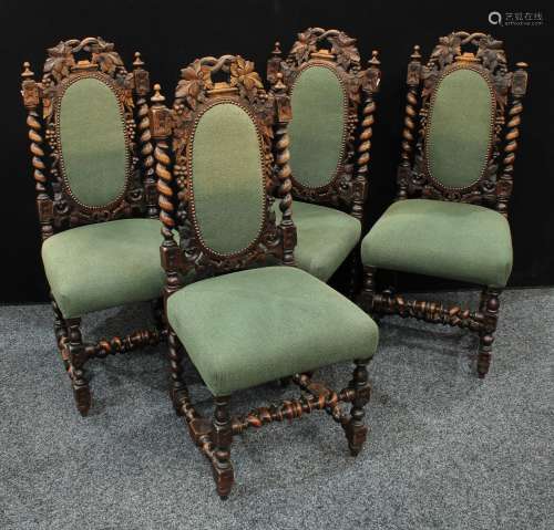 A set of four Jacobean style oak dining side chairs (4)