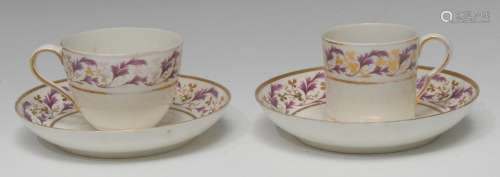 A Pinxton coffee can, Bute shape tea cup and two saucers, pattern No. 275, decorated in puce and