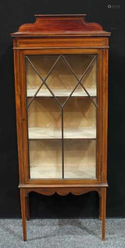 An Edwardian mahogany display cabinet, shaped half gallery above a rectangular top, astro glazed