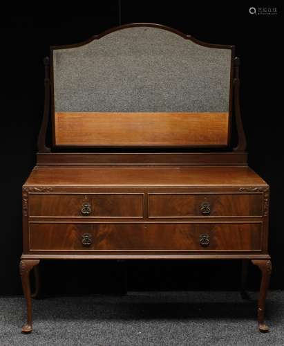 A Queen Anne style mahogany dressing table, bevelled arched looking glass above a rectangular top,