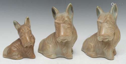 Langley Pottery - two stylised Scottie Dogs, in tan and grey, 21cm high, printed marks, Oakes