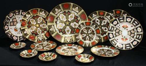 A Royal Crown Derby 2451 pattern shaped circular plate, 21.5cm diameter, another circular, seconds