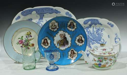 A late 19th century continental Sevres style dish, the centre decorated with Louis XVI and other