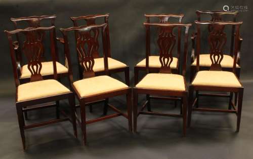 A set of eight Chippendale Revival mahogany dining chairs, comprising six side chairs and a pair