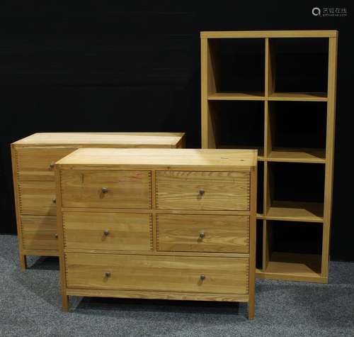 A pair of contemporary chest of drawers, rectangular top above four small and one long drawers, 82cm