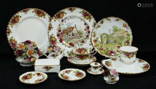 A Royal Albert Old Country Roses pattern dinner plate, tennis set, teacup and saucer, miniature