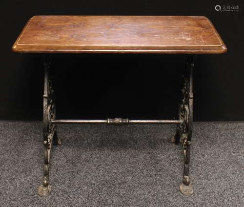 A cast iron and oak pub table, rectangular top, embossed brown & co Derby, 74cm high, 92cm wide,